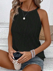 Textured round neck tank with intricate fabric pattern, paired with casual shorts and accessories.