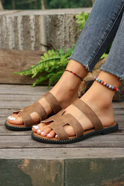 Black leather H band slides with cushioned footbed for comfort.