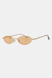 Nicole Lee Finley Oval Metal Frame Sunglasses with UV protection and chic design.