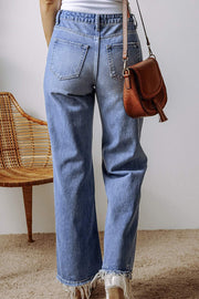 Distressed Straight Leg Jeans in sky blue with trendy rips and fading, high-rise waist, back view.