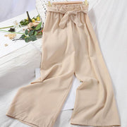 Elastic waist casual pants with bow, wide-leg design, beige color, perfect for comfort and style.