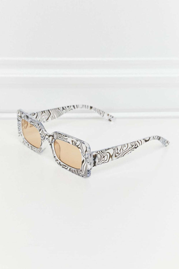 Tortoiseshell rectangle polycarbonate sunglasses with UV400 protection.