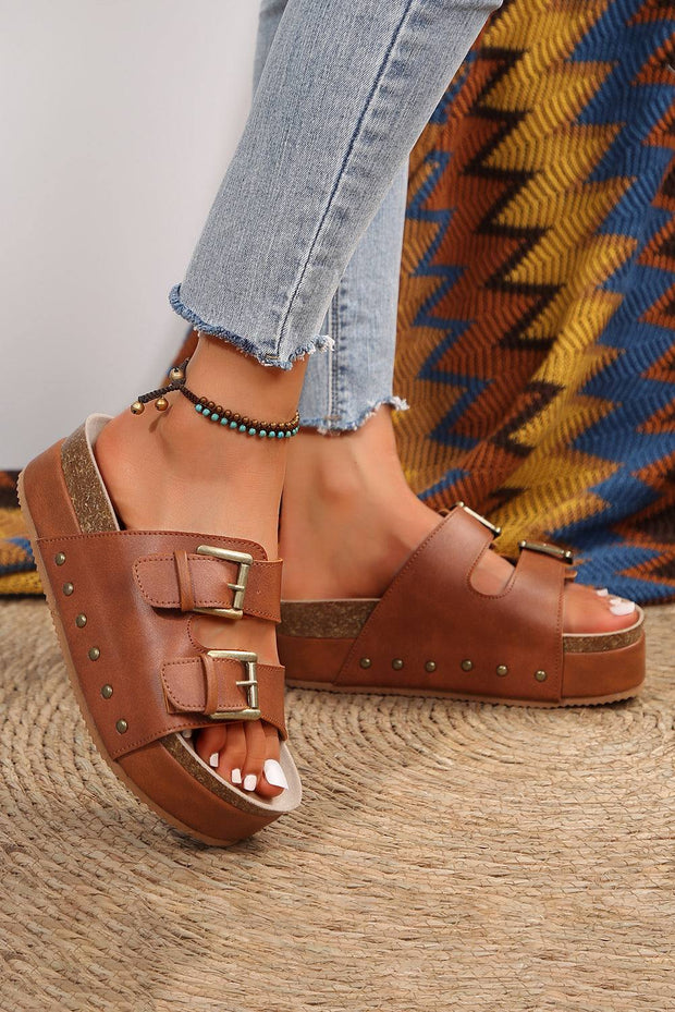 Chestnut Studded Platform Slides with dual buckle design and platform sole.