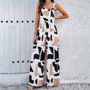 Trendy square neck jumpsuit with a bold geometric pattern, enhancing silhouette.