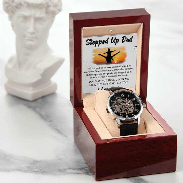 Openwork watch for dad in mahogany style gift box with intricate design and black leather band.