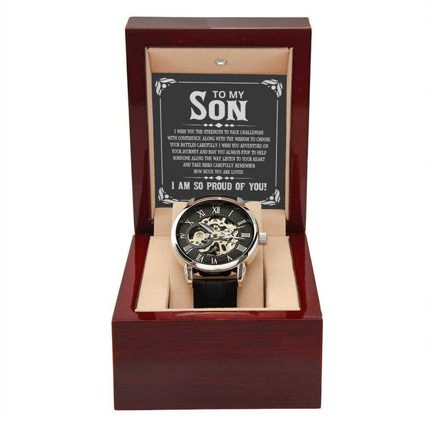 Openwork watch with black leather band in luxury mahogany box for son.