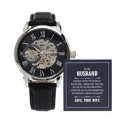 Husband Openwork Watch for Men with black leather band and intricate openwork design.