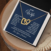 Interlocking Hearts Wife Necklace with gold finish in gift box, symbolizing everlasting love.