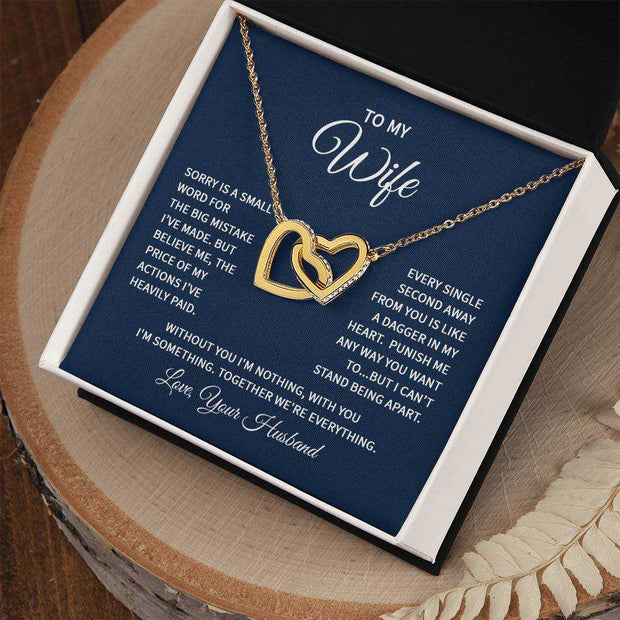 Interlocking Hearts Wife Necklace with gold finish in gift box, symbolizing everlasting love.