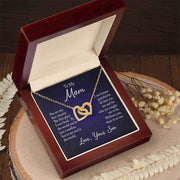 Interlocking Hearts Mom Necklace in gift box, symbolizing mother-child bond.