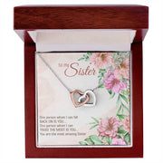 Interlocking Heart Necklace in gift box, featuring two heart pendants, perfect for expressing love and positivity.