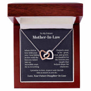 Interlocking Hearts Necklace in gift box with rose gold and steel finish, perfect for expressing love and unity.