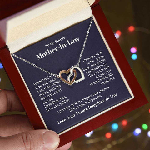 Interlocking Hearts Necklace in gift box, symbolizing love and connection, with polished heart pendant and chain.