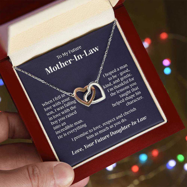 Interlocking Hearts Necklace in gift box, symbolizing love and connection, with polished heart pendant and chain.