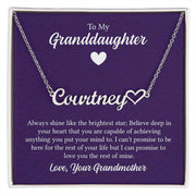 Heart-shaped personalized granddaughter necklace with 'Courtney' on a purple background, gift from grandmother.
