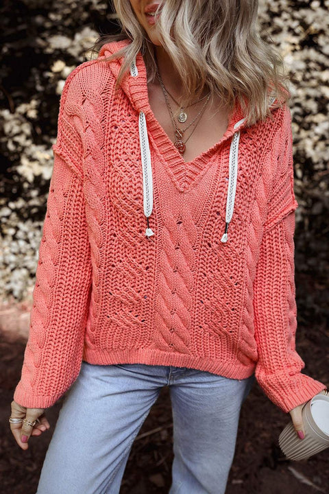 Cable-Knit Hooded Sweater with drawstring in coral, stylish and cozy design.