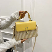 Western Shoulder Handbag with yellow accent and woven texture, featuring decorative hardware and a functional crossbody strap.