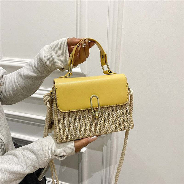 Western Shoulder Handbag with yellow accent and woven texture, featuring decorative hardware and a functional crossbody strap.