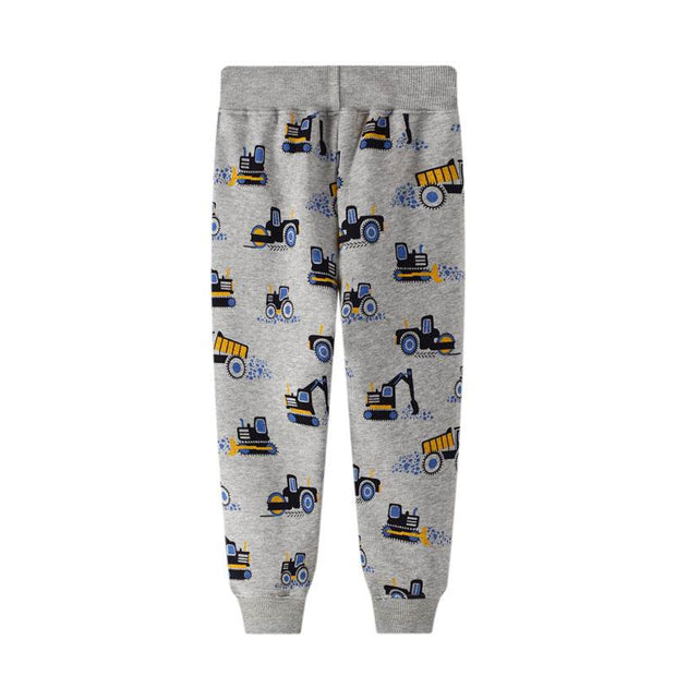 Boys spring and autumn pants with a playful construction vehicle pattern, featuring adjustable waistband and durable fabric.