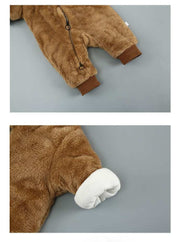 Warm baby cotton onesie in brown with cuffs and zipper closure.