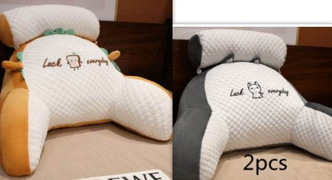 Fluffy sofa cushion pillow with ergonomic design and embroidered patterns, two pieces shown in contrasting colors.