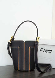 Elegant large capacity shoulder bag in black, featuring contrast stitching and durable leather design.