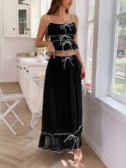 Frill square neck cami and skirt set in black with delicate frills and tied design, chic and elegant fashion outfit.
