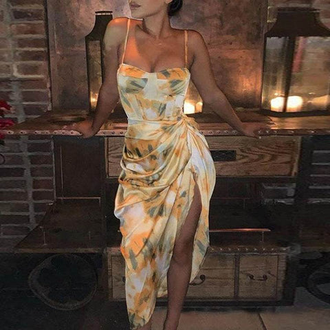 Summer Sexy Sling Dress with vibrant yellow print and elegant slit, perfect for warm-season events.