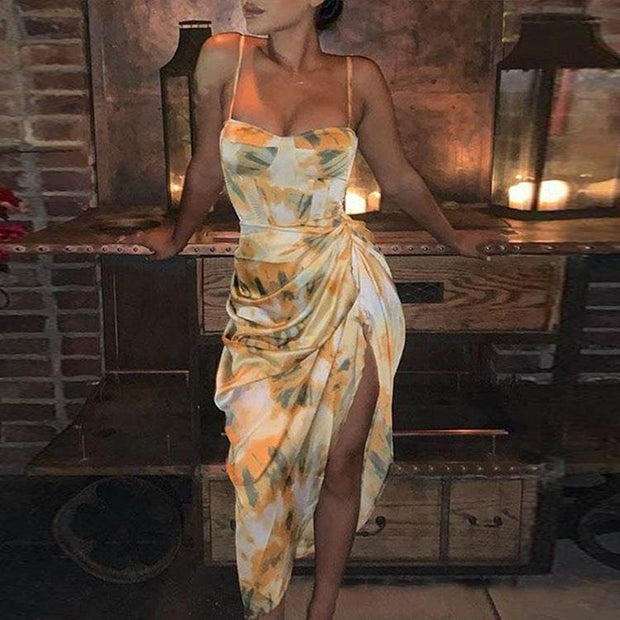 Summer Sexy Sling Dress with vibrant yellow print and elegant slit, perfect for warm-season events.