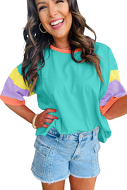 Oversize Color Block Top with round neckline, vibrant sleeves, and relaxed fit for casual wear.