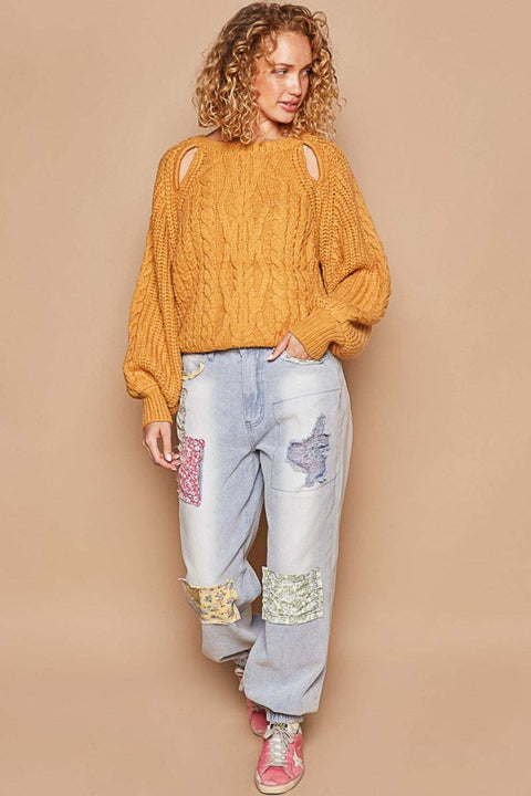 POL Cable Knit Long Sleeve Sweater in mustard yellow with cutout details, paired with patchwork jeans.