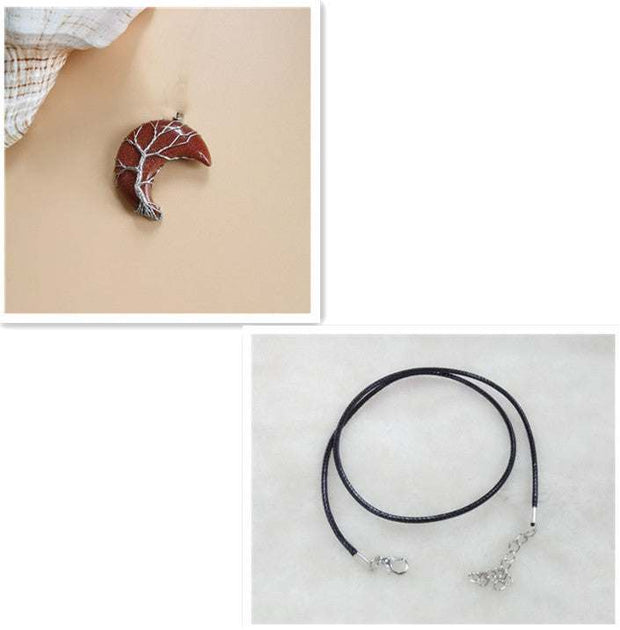 Moon Tree Of Life Necklace with crescent moon pendant and black leather rope.