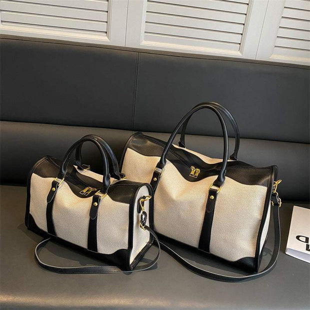 Large Capacity Purse with black and white design, featuring sturdy handles and optional shoulder straps, ideal for modern women needing style and functionality.