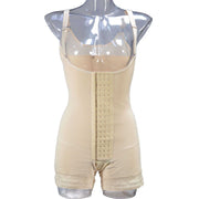 Beige breasted body sculpting pants on clear mannequin displaying high waist and adjustable straps.