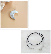 Moon Tree Of Life Necklace with crescent moon pendant and adjustable black leather rope.