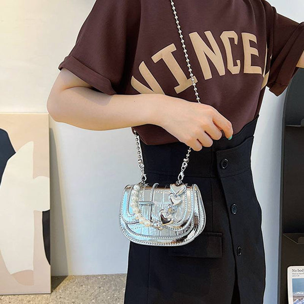 Silver Laser Pearl Girl Tote with chain strap and stylish laser-cut design.