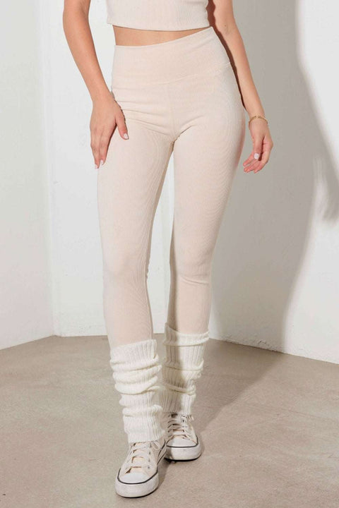 Le Lis Ribbed Cami and Leggings Set in beige, featuring a crop cami top with contrast binding and high-waisted leggings; ideal for yoga and workouts.
