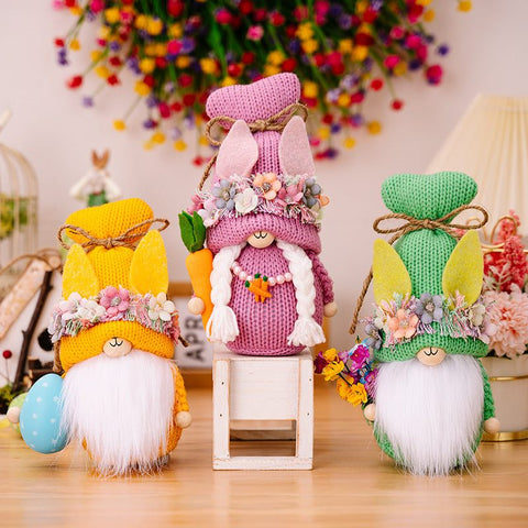 Easter Knit Faceless Doll with colorful hats and floral accents, perfect for holiday decoration or children's play.