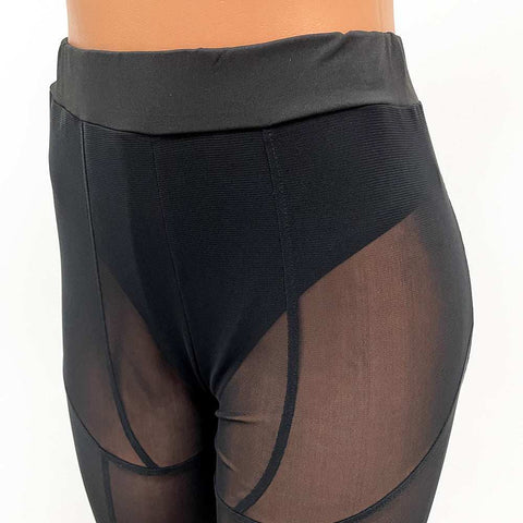 Women's mesh leggings with elegant design and mid-waist fit in black.