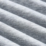 Close-up of soft grey fabric texture for Kitten Graphic Sweatshirt made of cotton-polyester blend