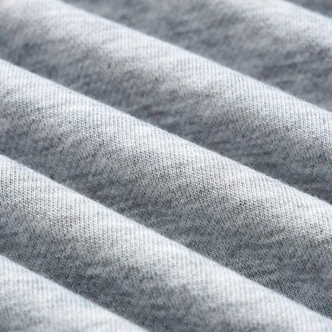 Close-up of soft grey fabric texture for Kitten Graphic Sweatshirt made of cotton-polyester blend