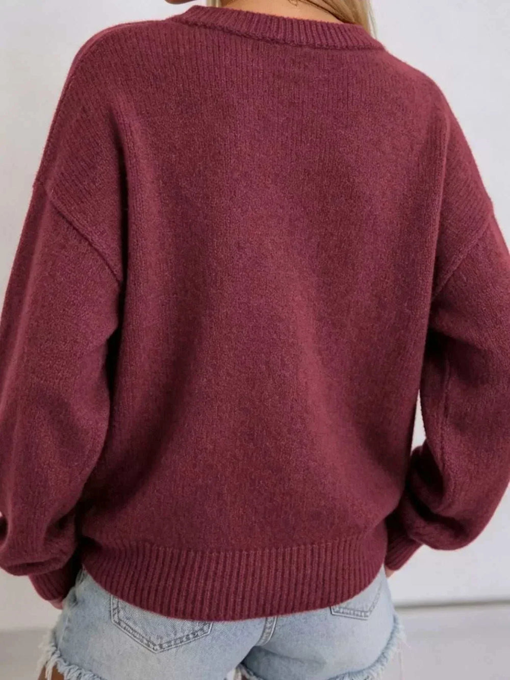 Candy Cane Christmas Sweater in solid burgundy knit with a soft fuzzy texture, ribbed cuffs and hem, shown from the back