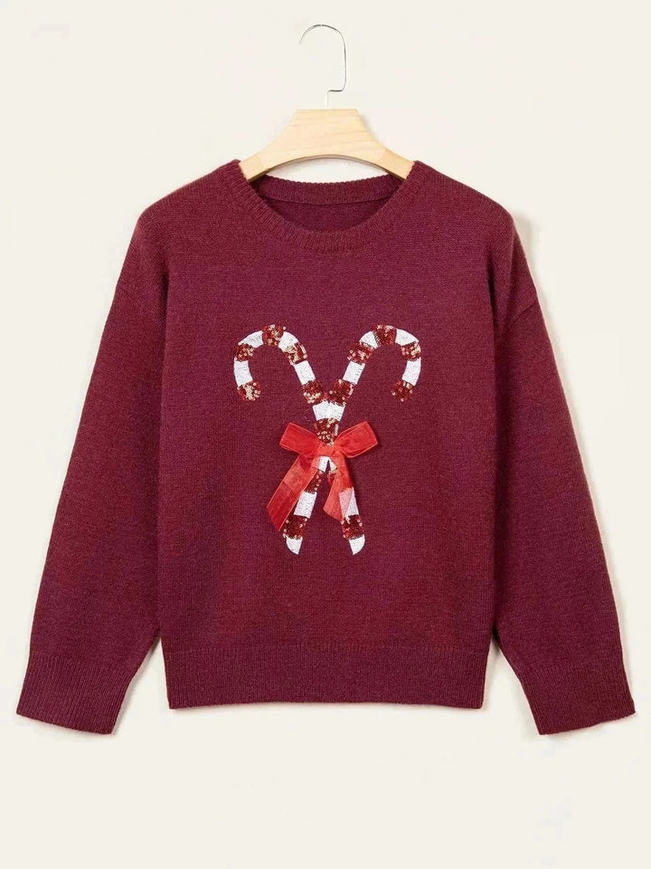 Candy Cane Christmas Sweater in burgundy knit with a red bow and white sequined candy cane design on the front