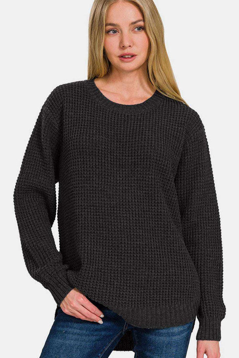 Zenana High Low Waffle Sweater in black, waffle-knit texture, worn with jeans.