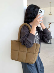 Large Capacity Hand Bag with ample space and versatile design, ideal for work and travel.