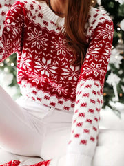Red and white long sleeve sweater with intricate snowflake pattern, cozy winter wear