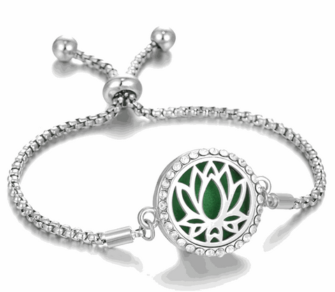 Hollow Stainless Steel Aromatherapy Bracelet with lotus design and adjustable band.
