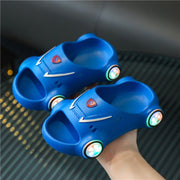 Kids Glowing Slippers with LED lights in blue sports car design.