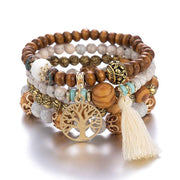 Boho Wooden Stretch Bracelet with polished wooden beads and tassel charm.