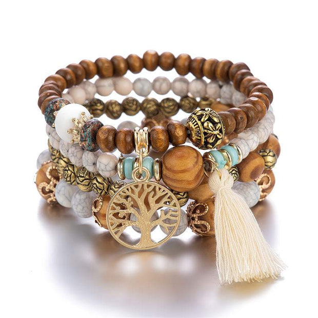 Boho Wooden Stretch Bracelet with polished wooden beads and tassel charm.